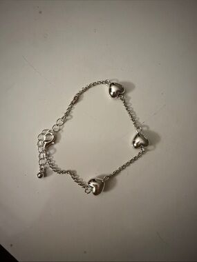 Bracelet with 3 hearts in silver colour